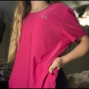 a hot pink under armor’s work out shirt